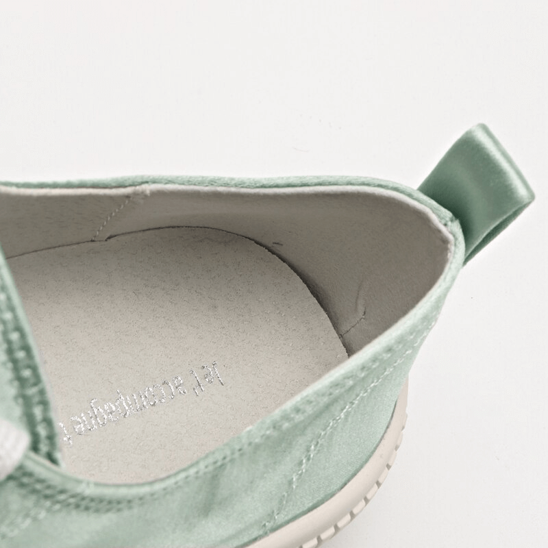 Close-up of Women's Lace Up Sports Shoe SF1008 showcasing cotton lining and thick sole for comfort.